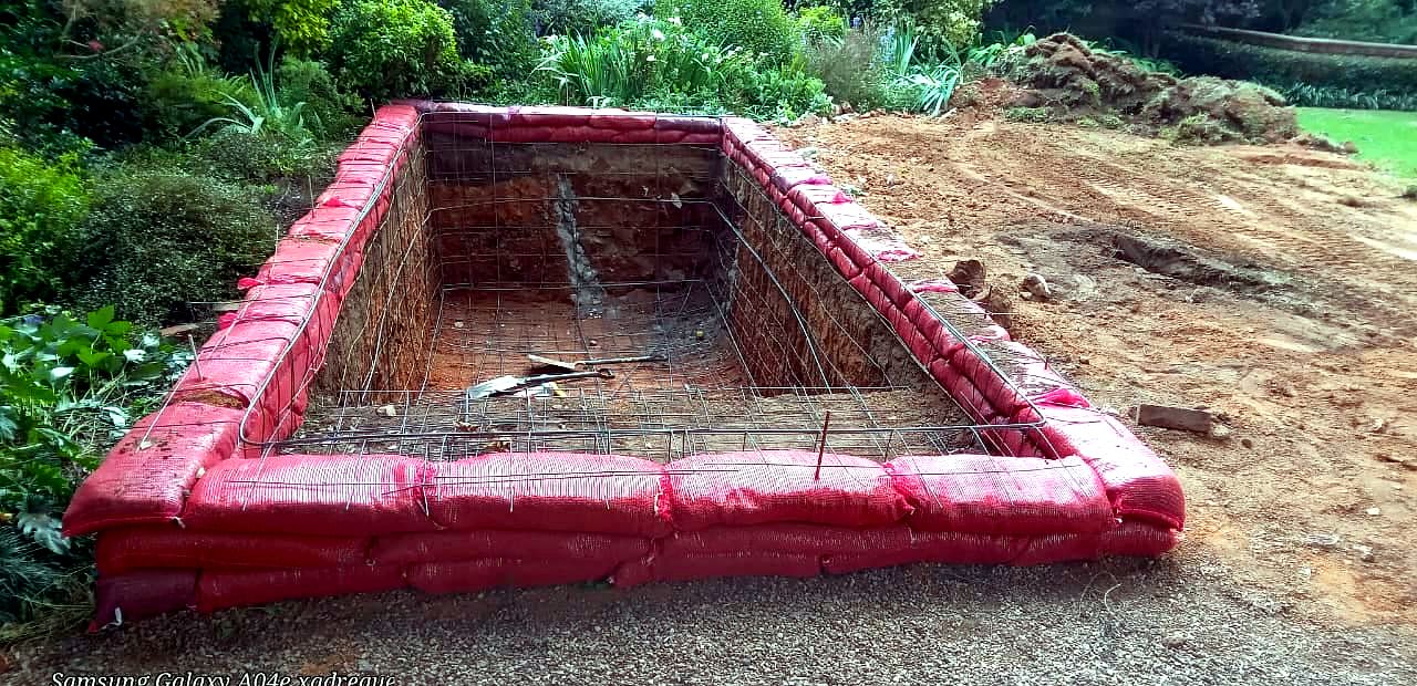 Pool excavation with steel reinforcing
