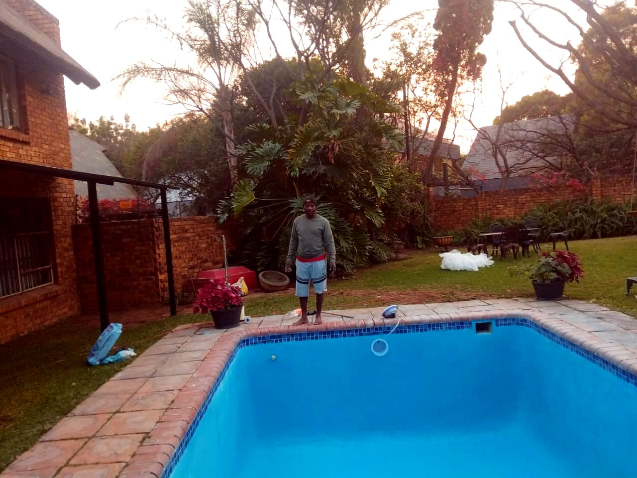 Repainted garden pool at dusk