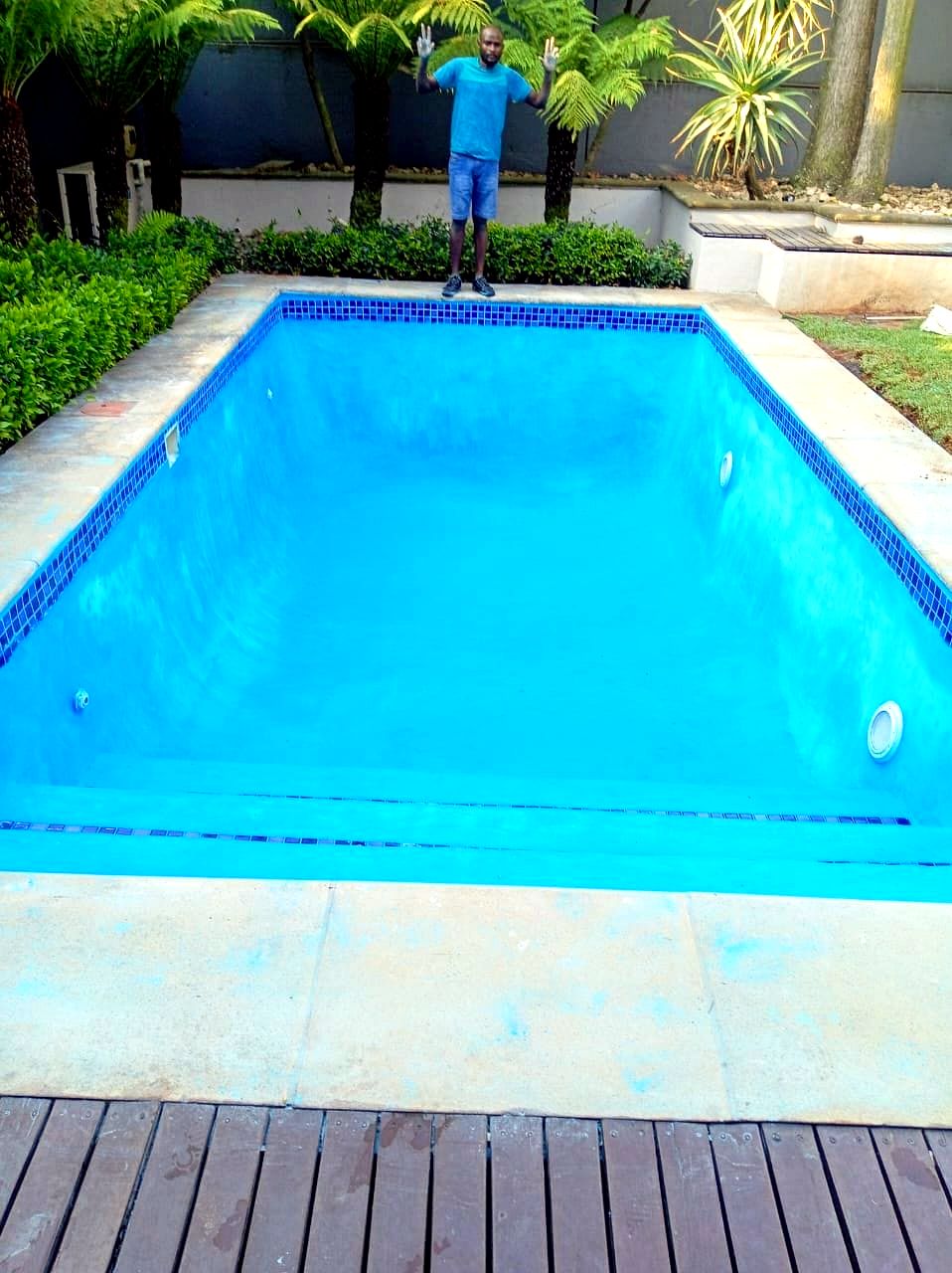 Freshly resurfaced bright blue pool