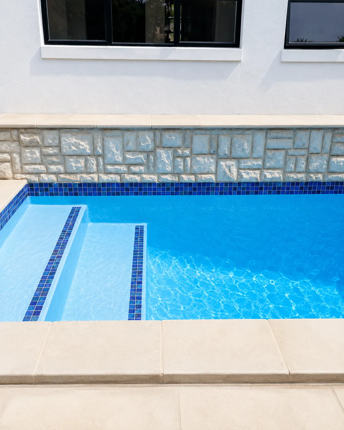 Blue mosaic resurfaced pool