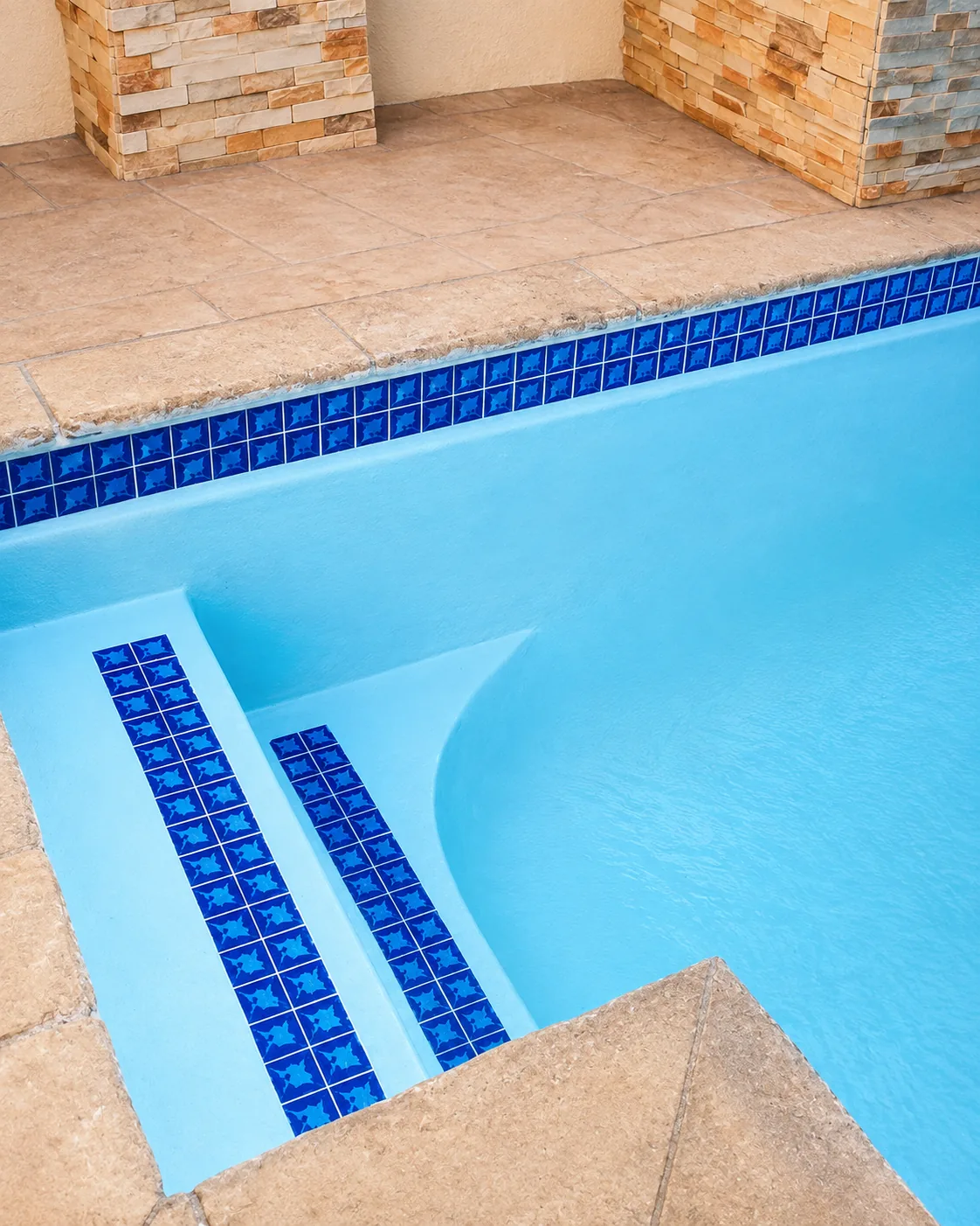 Patterned tile steps in pool
